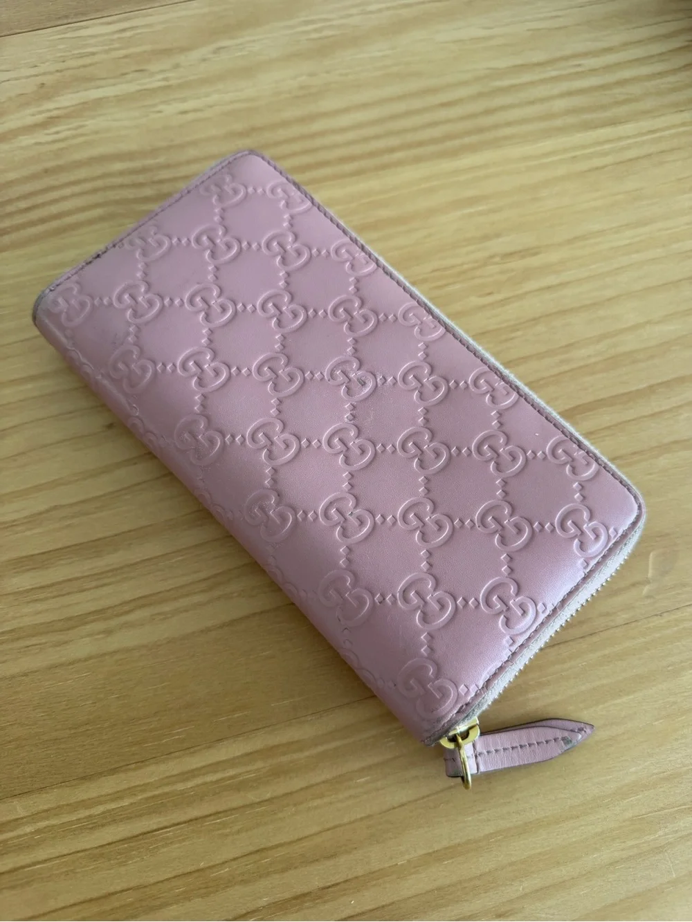 Gucci Pink Embossed GG Zip-Around Leather Wallet